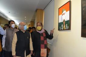 President, ICCR is viewing the Painting on Netaji.